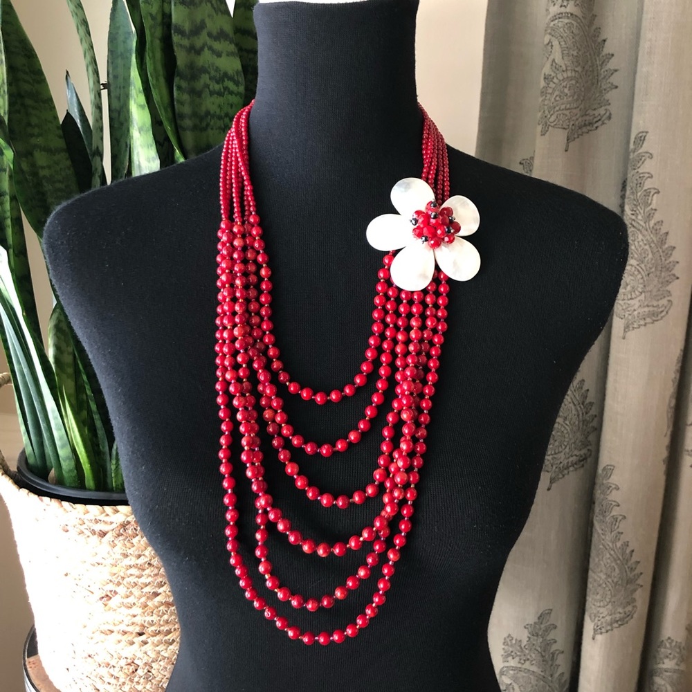 Multi-Strand Red Beaded Necklace with White Flower Accent